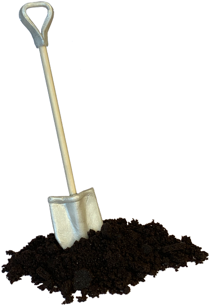 A shovel with the working end buried in a mound of dirt